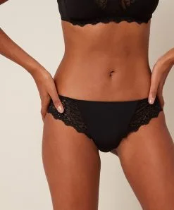 Simone Perele Tanga Caresse De Simone Pérèle Coloris Noir -SOUTIEN-GORGE Soldes Boutique Tanga Simone Perele Caresse noir 12A710 015 101