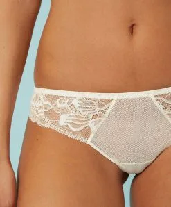 Simone Perele Tanga De La Collection Promesse Par La Marque De Lingerie Simone Pérèle. 9 Simone Perele Tanga De La Collection Promesse Par La Marque De Lingerie Simone Pérèle. -SOUTIEN-GORGE Soldes Boutique Tanga Simone Perele promesse naturel ivoire 12H710 030 101